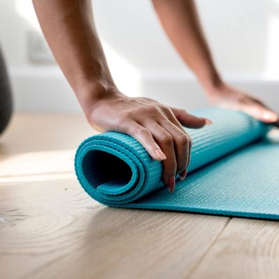 Yoga mat and participant