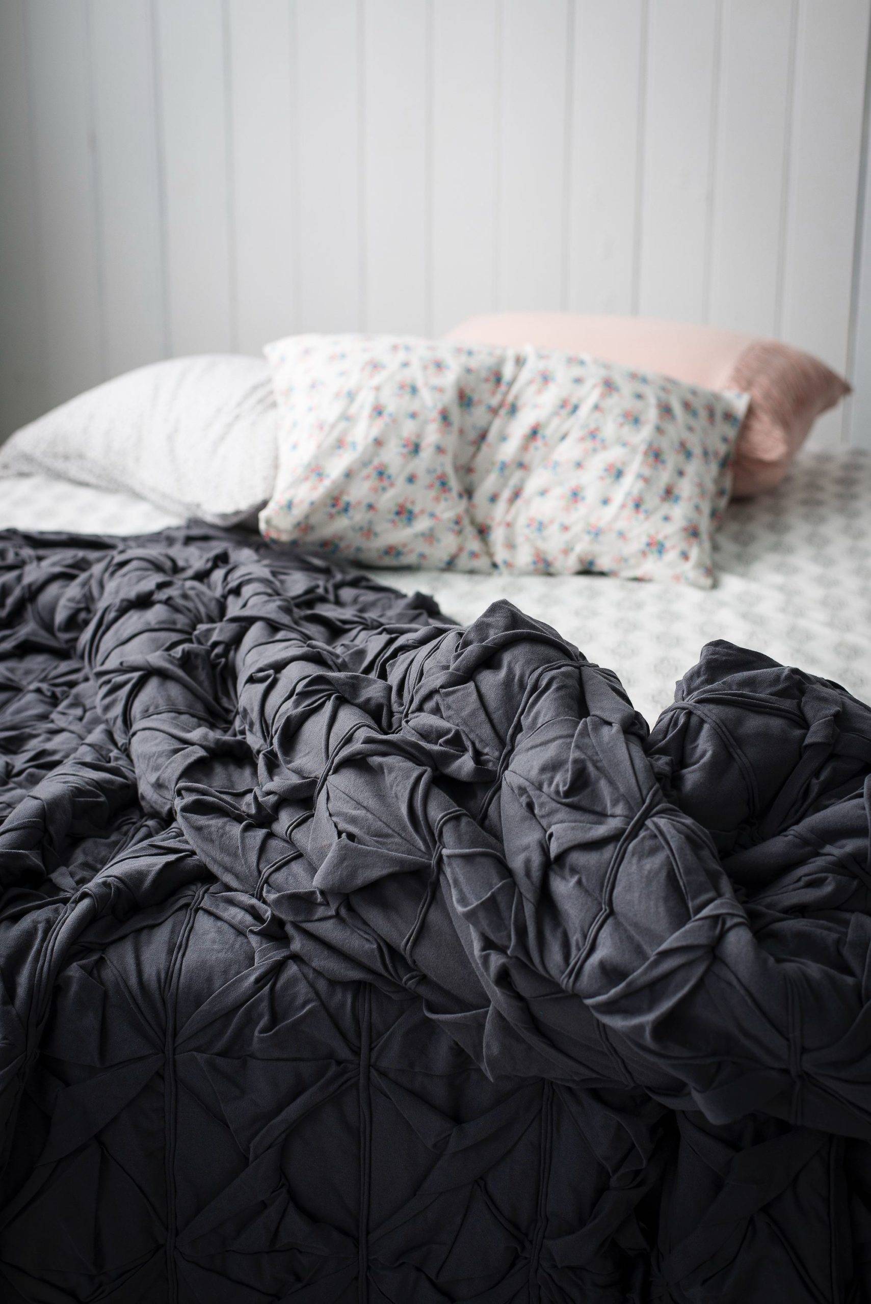 Bed with crumpled duvet