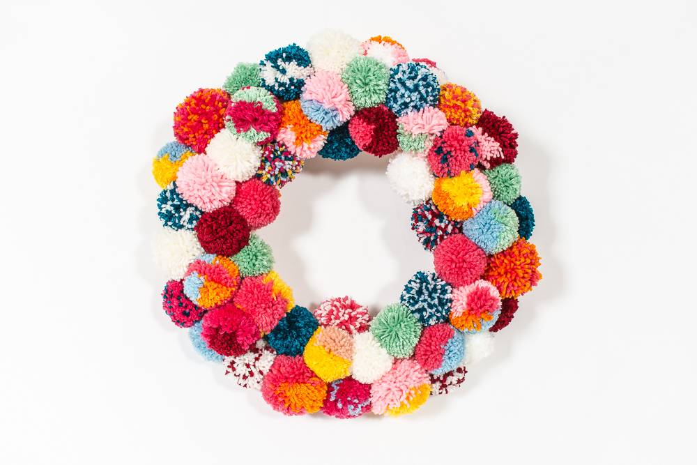Colorful boho pom-pom wreath