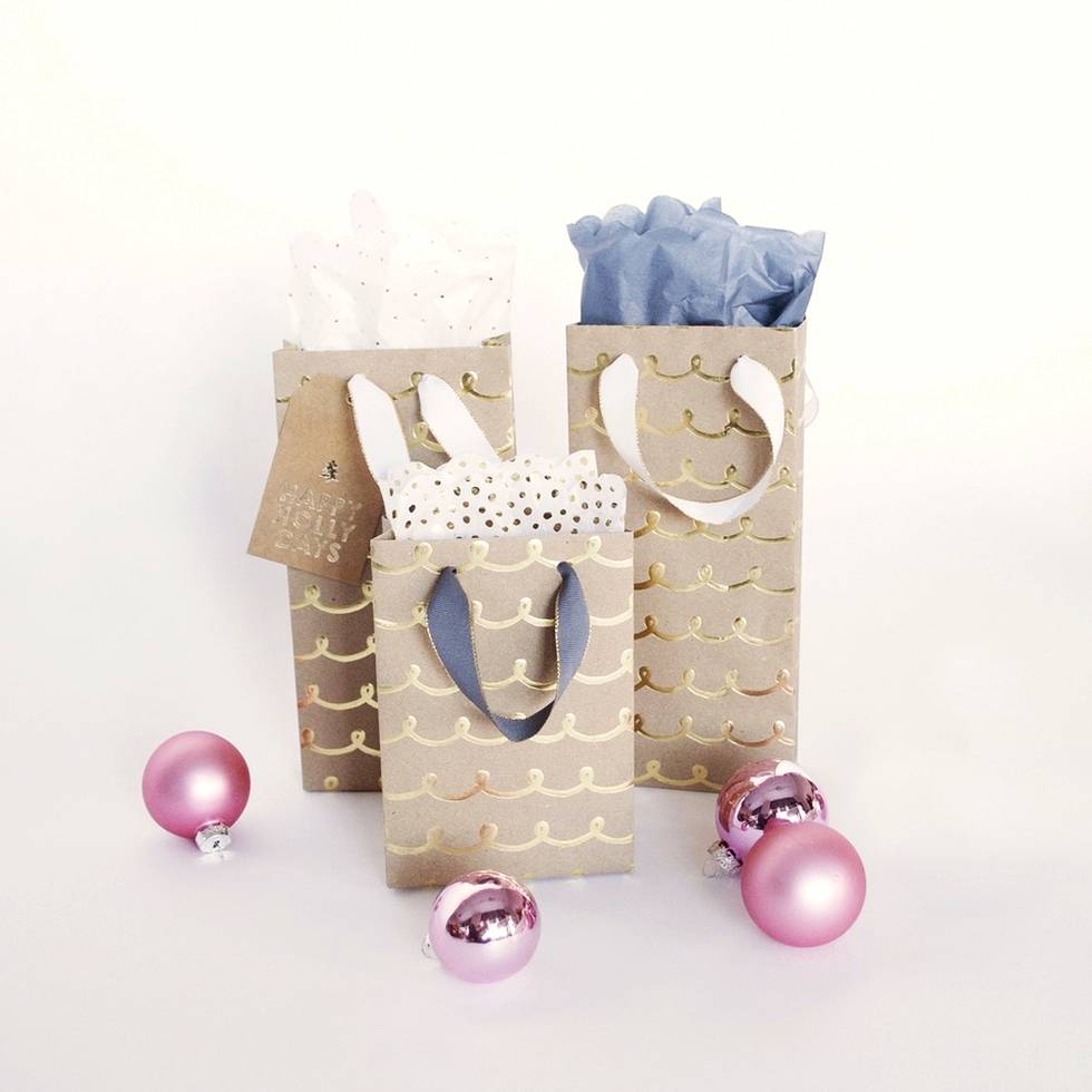 Learn how to make your own gift bags at home. Perfect for present-wrapping emergencies!
