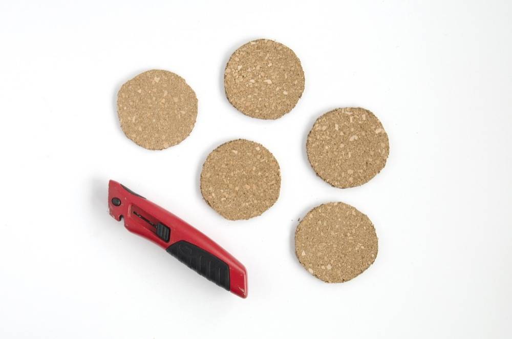 Cork rounds glue together to make thicker cork - used here as a stopper for a savings bank!