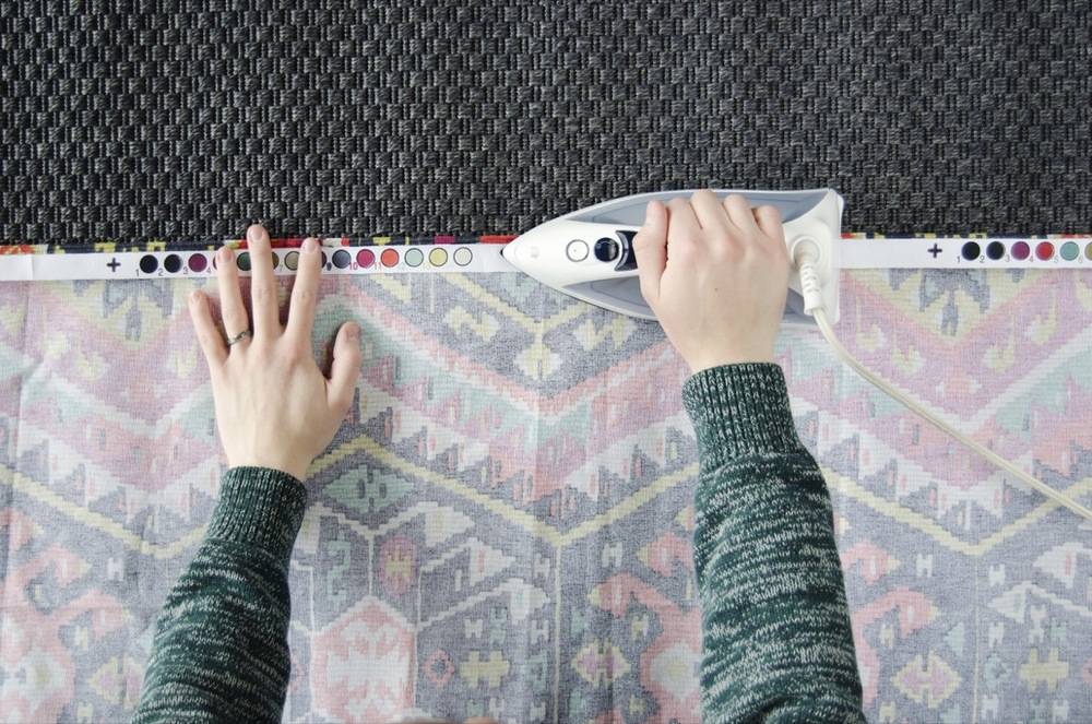 Iron-on hem tape makes this DIY hanging tapestry a breeze to make!