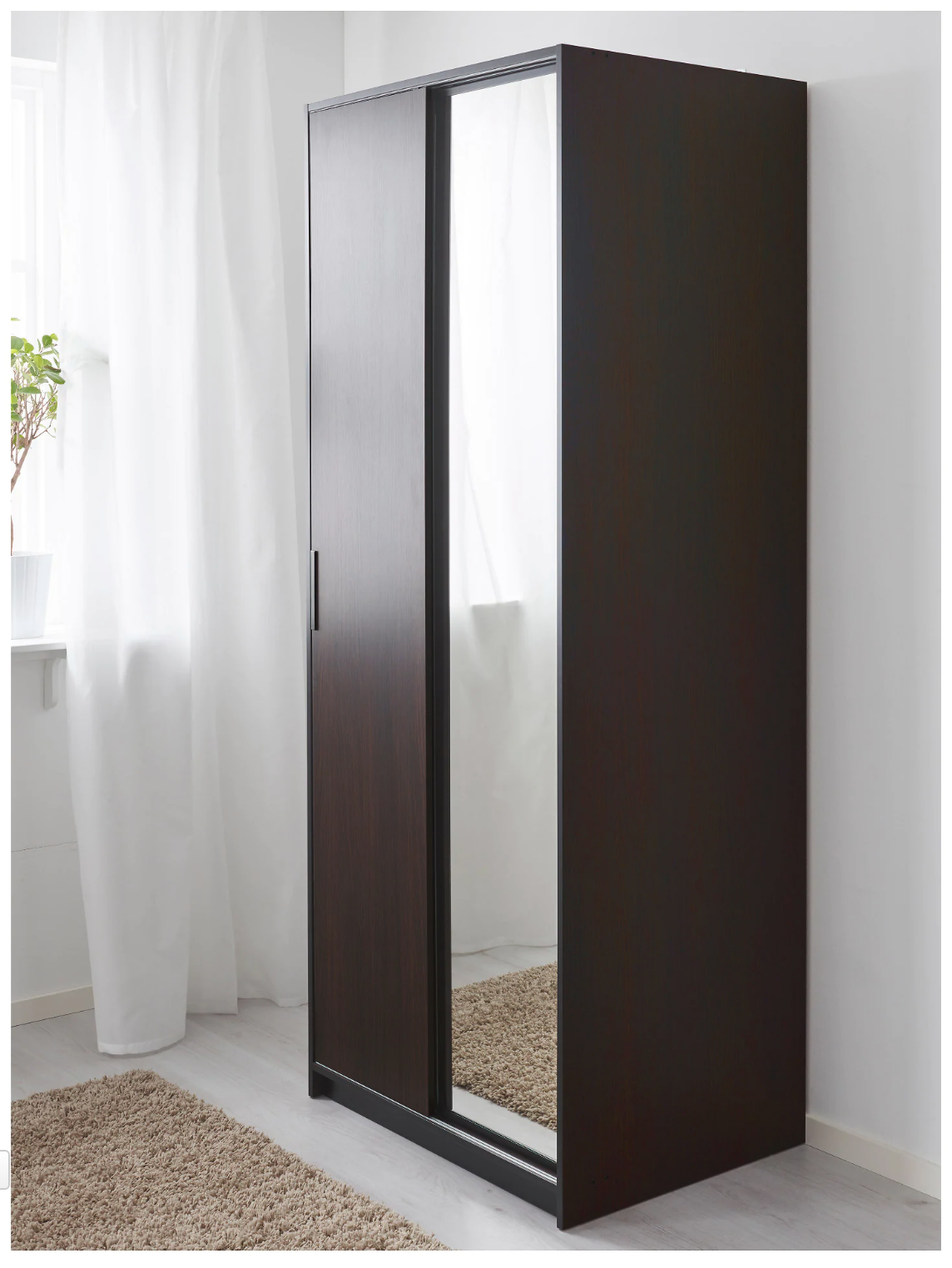 IKEA TRYSIL wardrobe with dark wood and mirrored door