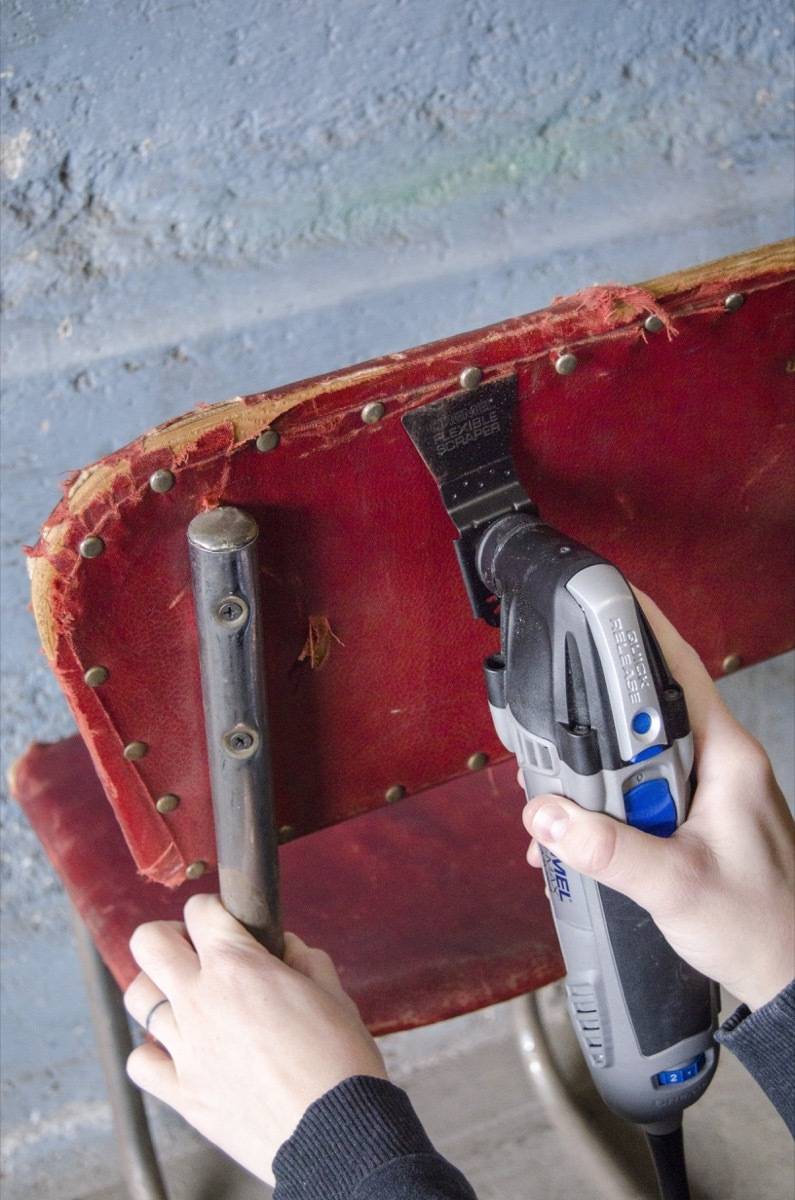 Using the scrape attachment on a Dremel oscillating tool