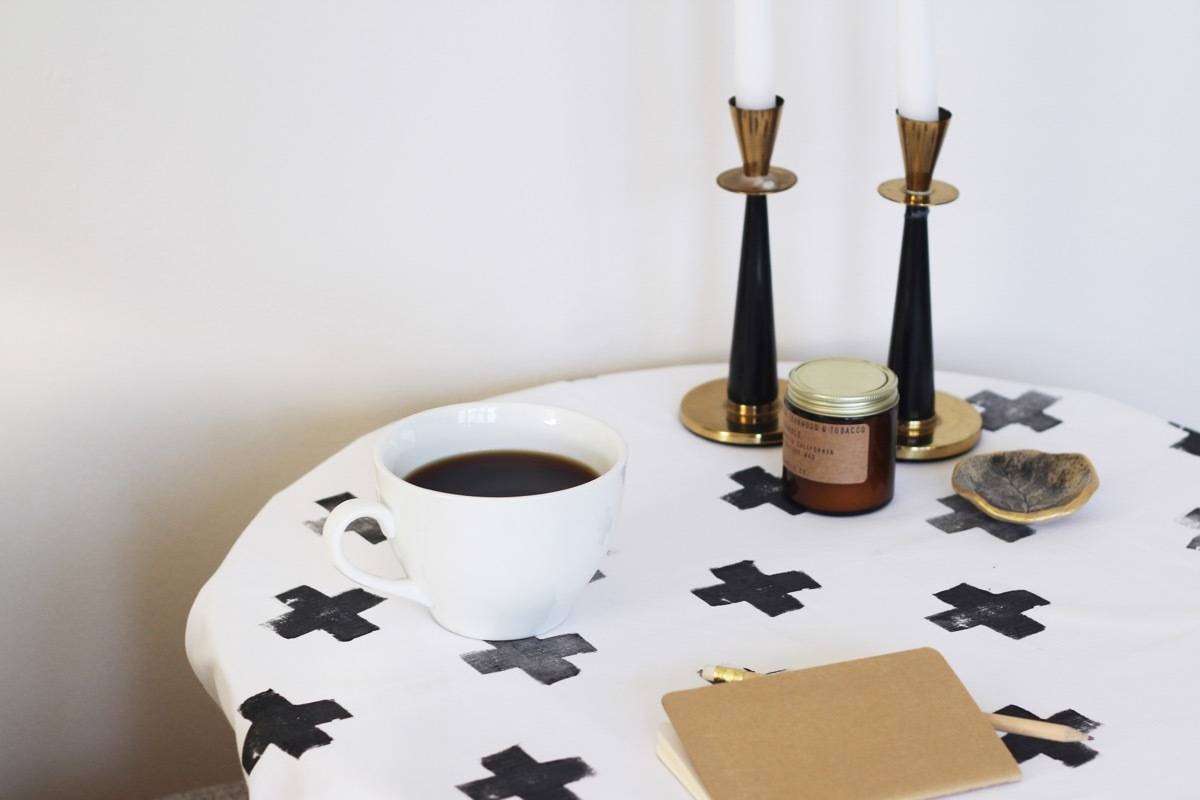 Make This: Stamped Tablecloth in Swiss cross pattern