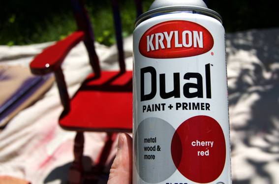 Man showing krylon dual paint + primer paint sprayer bottle.