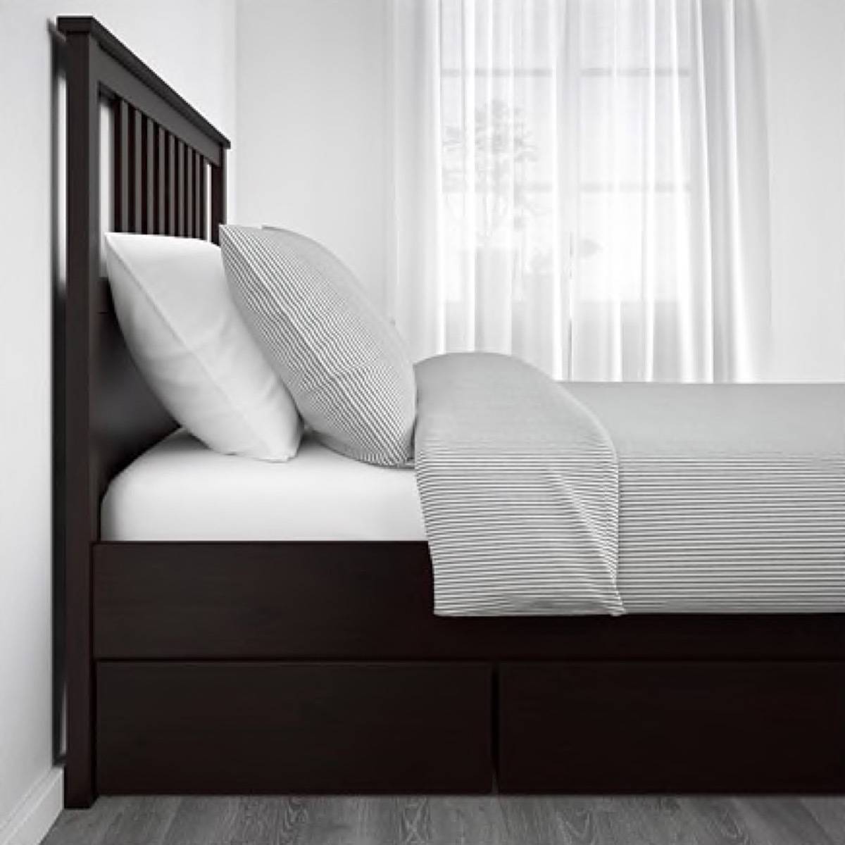 Bed with pull-out storage