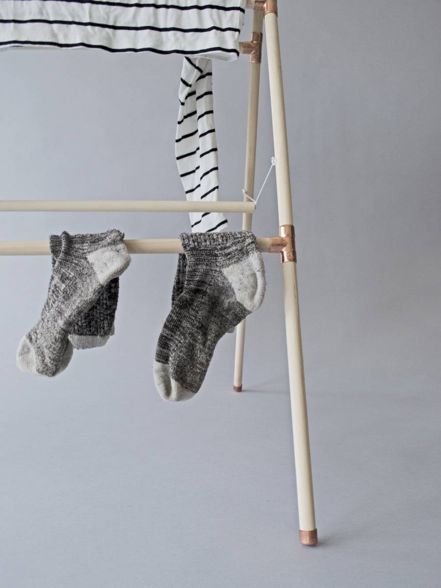 Save $ by air-drying your laundry. Make your own clothes drying rack out of wood and copper.