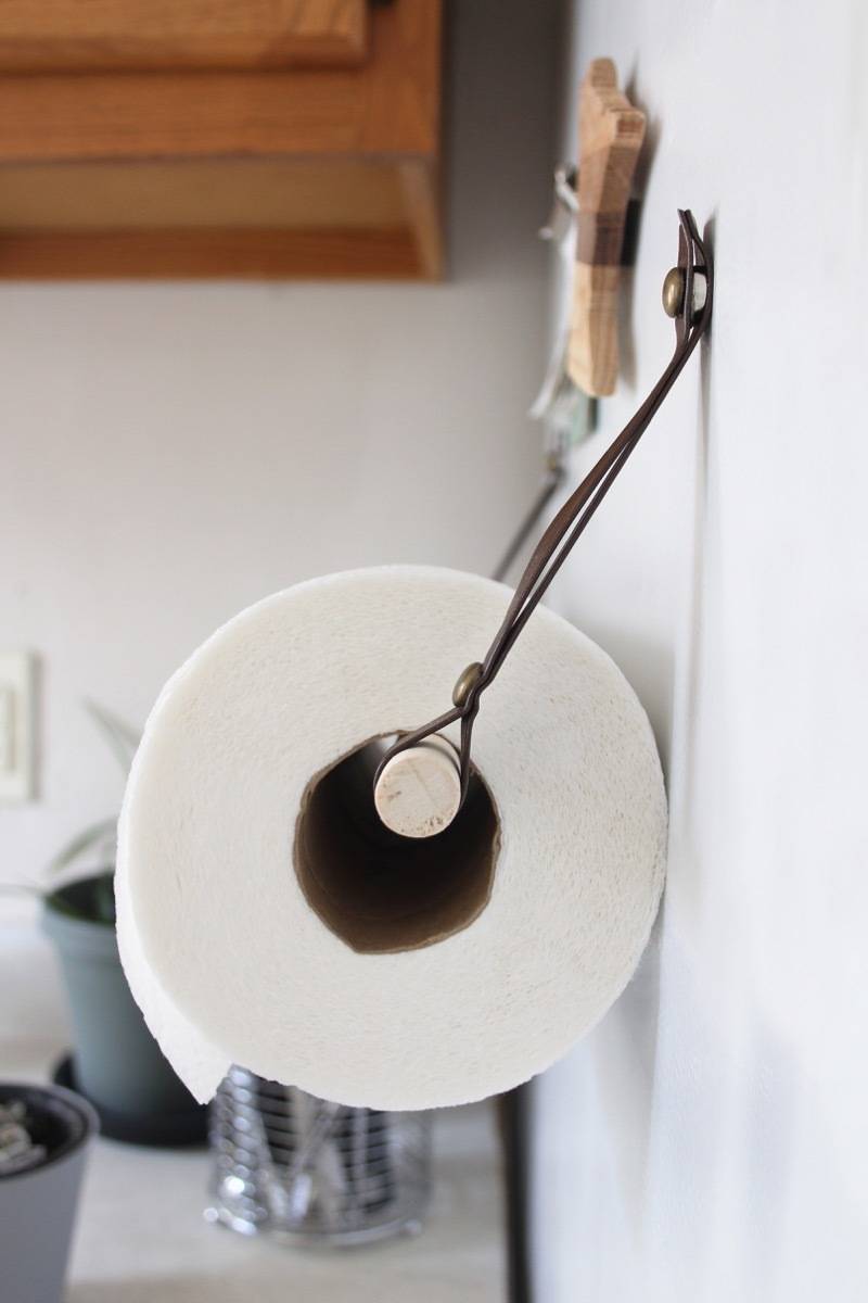 Save kitchen space and hang your paper towels from the fridge!