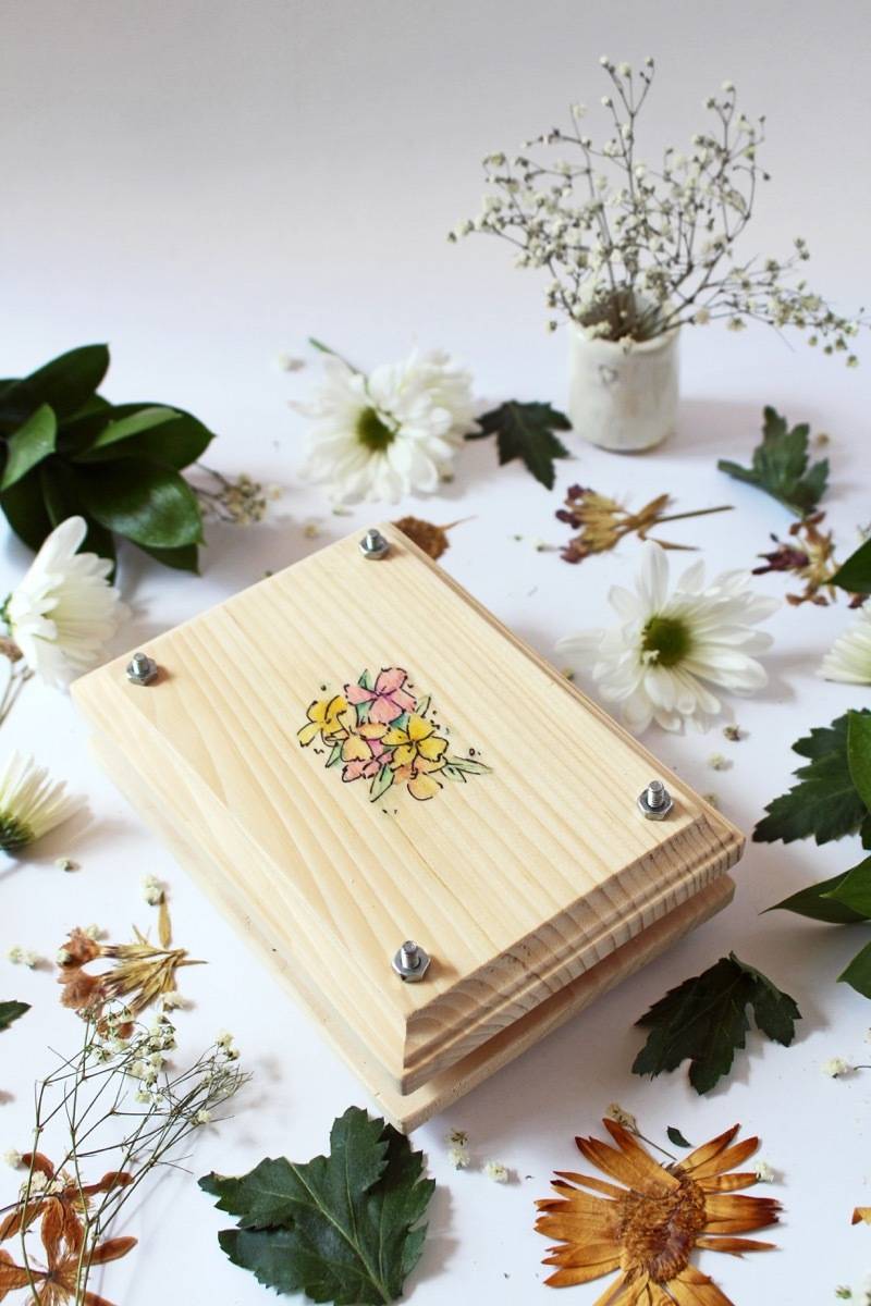 How to make your own flower press to keep spring alive all year long.