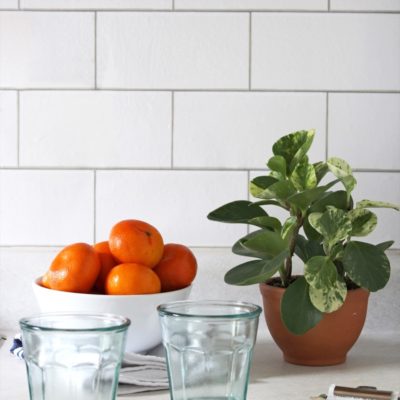 If you're a renter but want to improve your kitchen or bathroom, follow this tutorial on how to install a fake backsplash