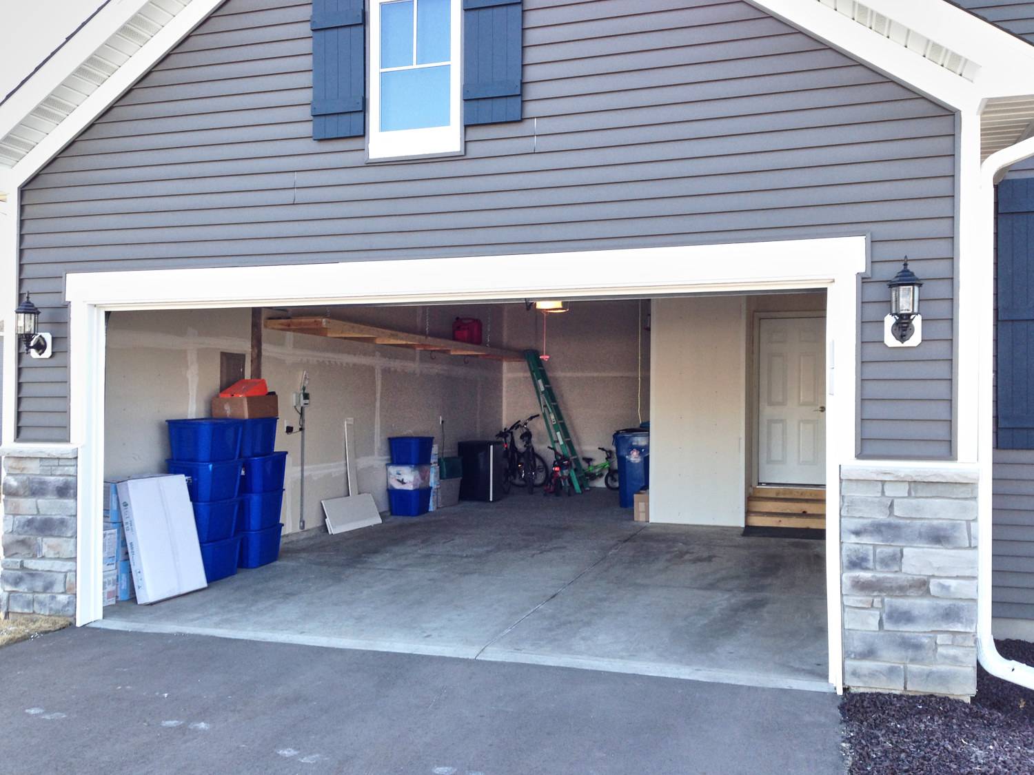 Garage floor with wear and tear, oil stains