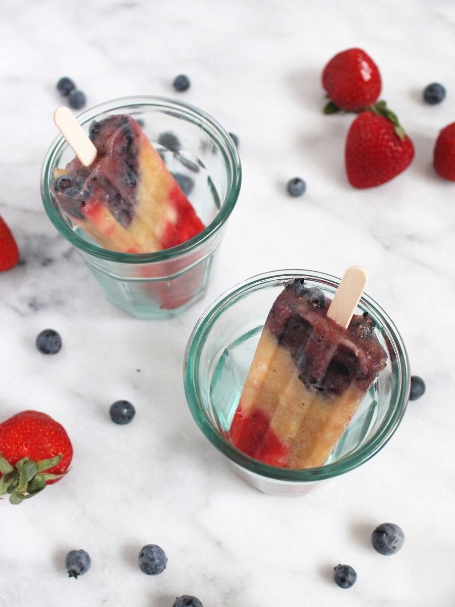 Blueberries, strawberries, bananas, and CHAMPAGNE! Perfect popsicles for the Fourth of July
