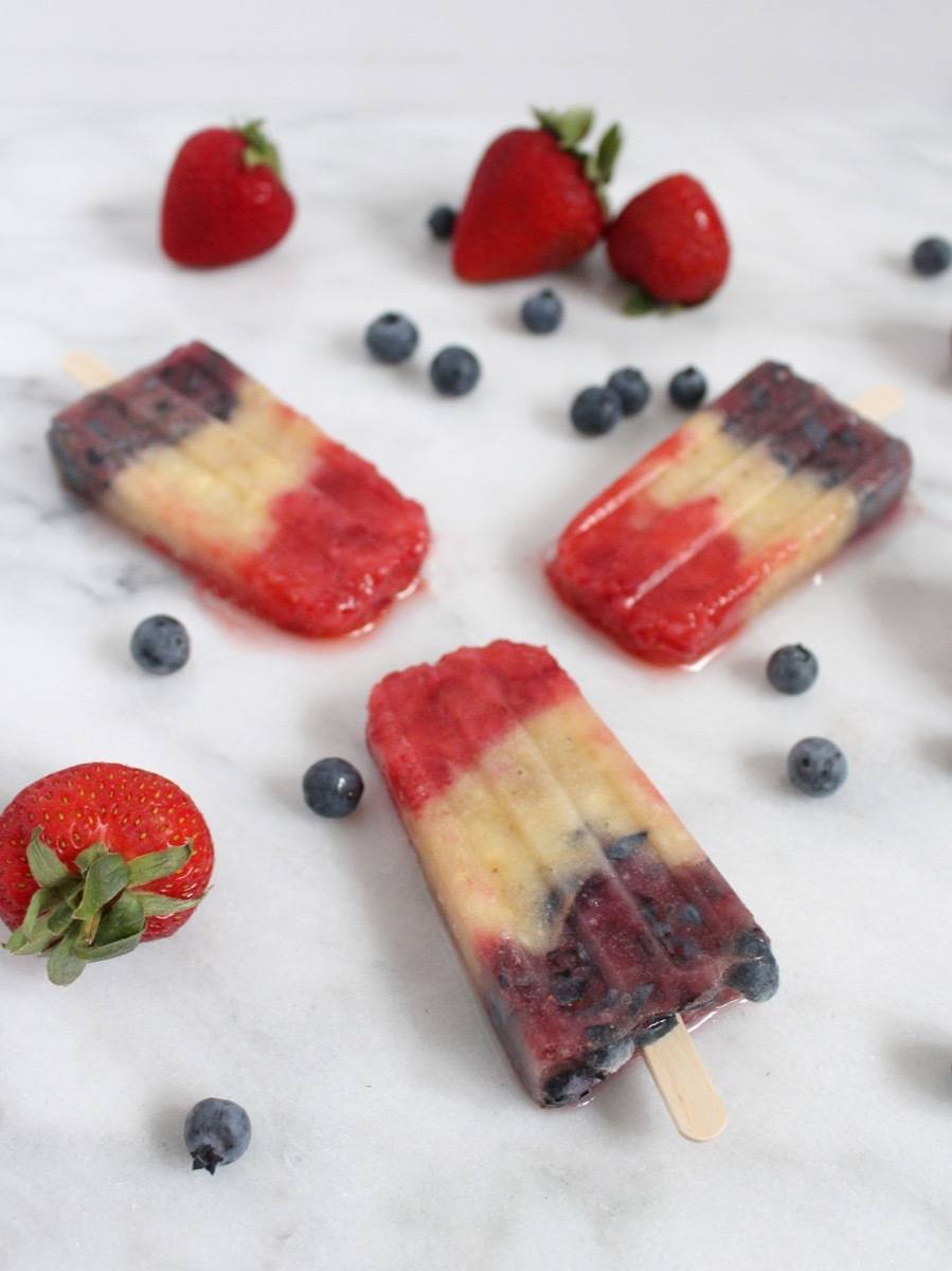 Blueberries, strawberries, bananas, and CHAMPAGNE! Perfect popsicles for the Fourth of July