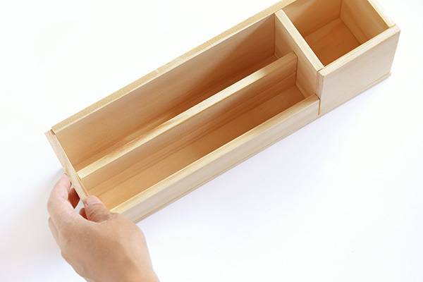 glue on the left edge piece of the wood desk organizer