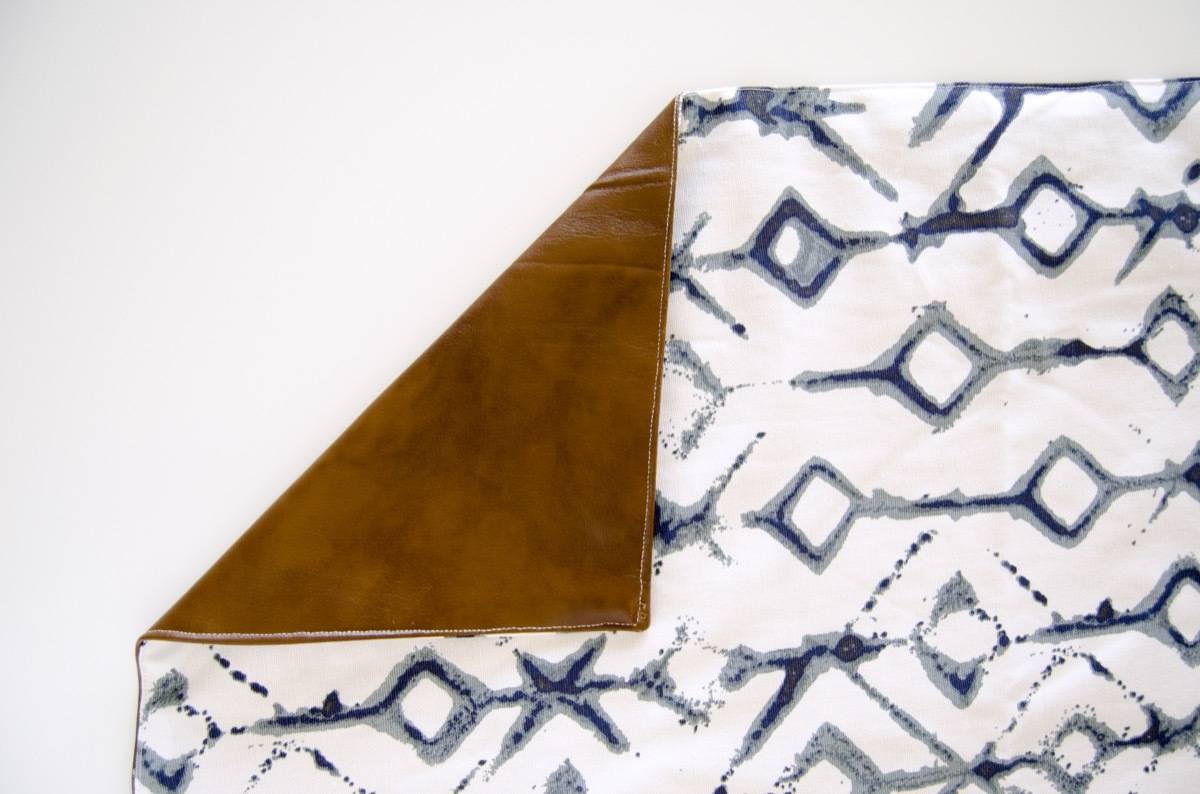 DIY Waterproof Picnic Blanket: Top stitch along all edges