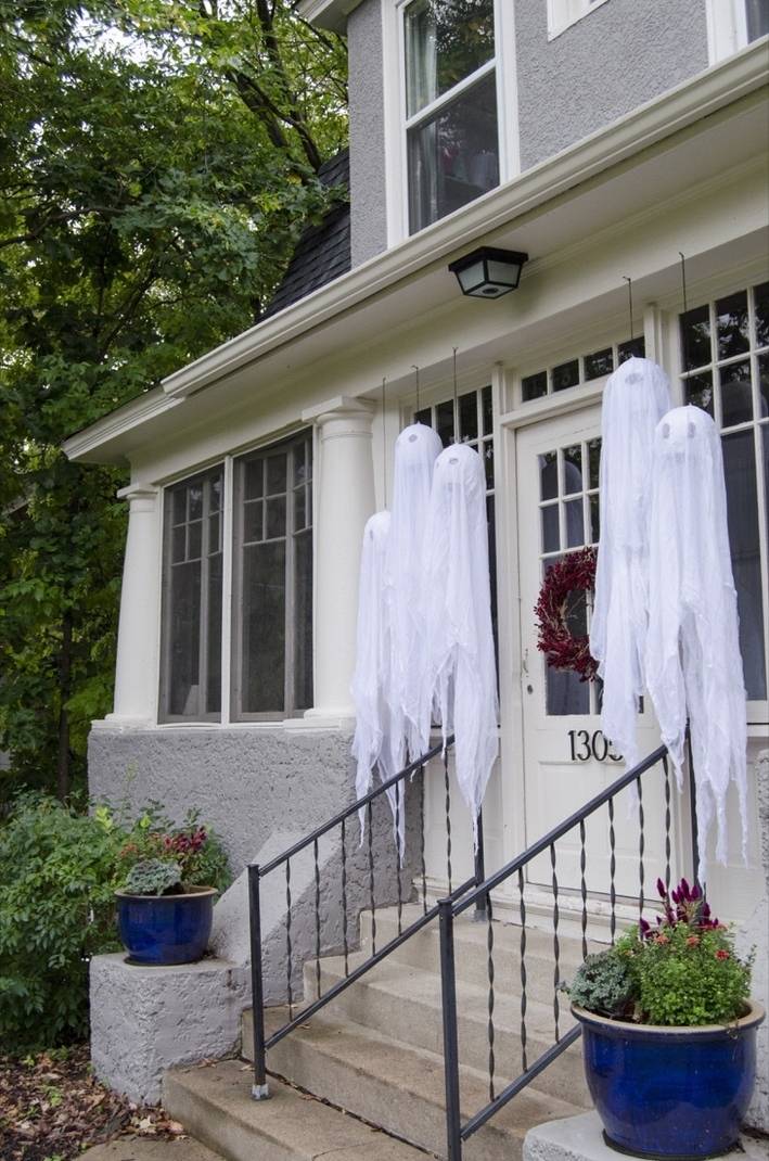 Wide shot of hanging ghost decor for Halloween