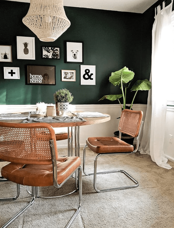 Forest green dining room accent wall from Decor Lovin