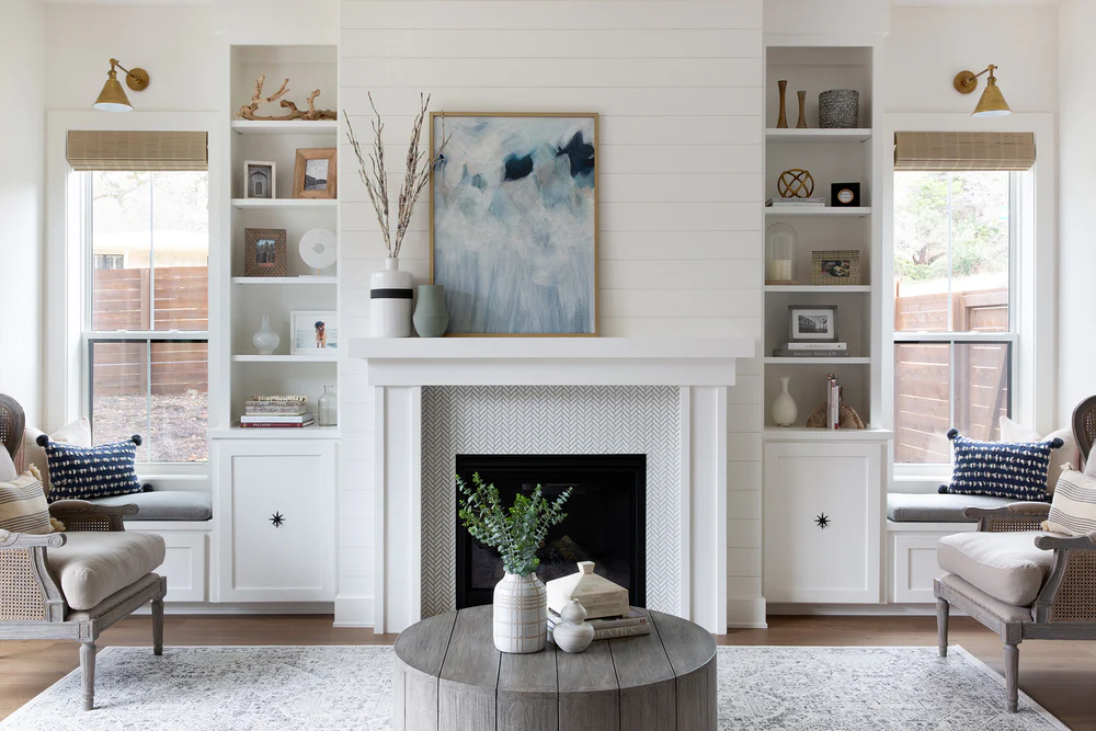 Soft white herringbone tile fireplace from Nuela Designs; Photography: Molly Culver Photography