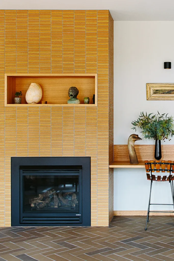 This brick fireplace has been updated with a gas fireplace insert. Modern fireplace ideas.