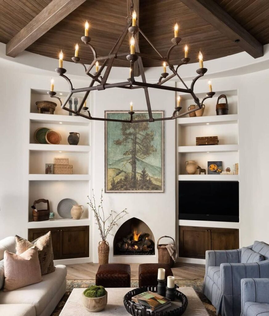 The perfect little Spanish-style fireplace with clean lines framing the flames. Modern fireplace ideas.