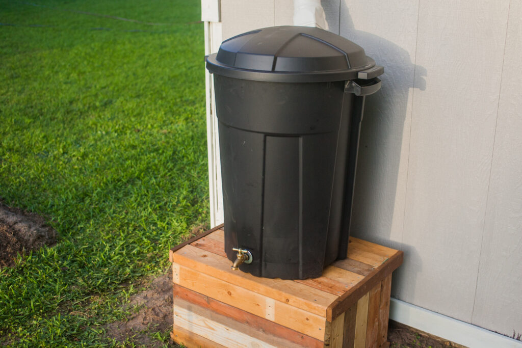 Budget landscaping cheap rain barrel tutorial from Man Made DIY.