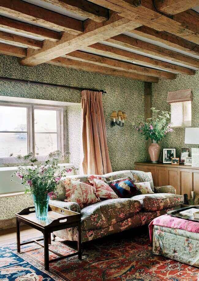 Mismatched botanical patterns make this home a cottage. Image by François Halard.