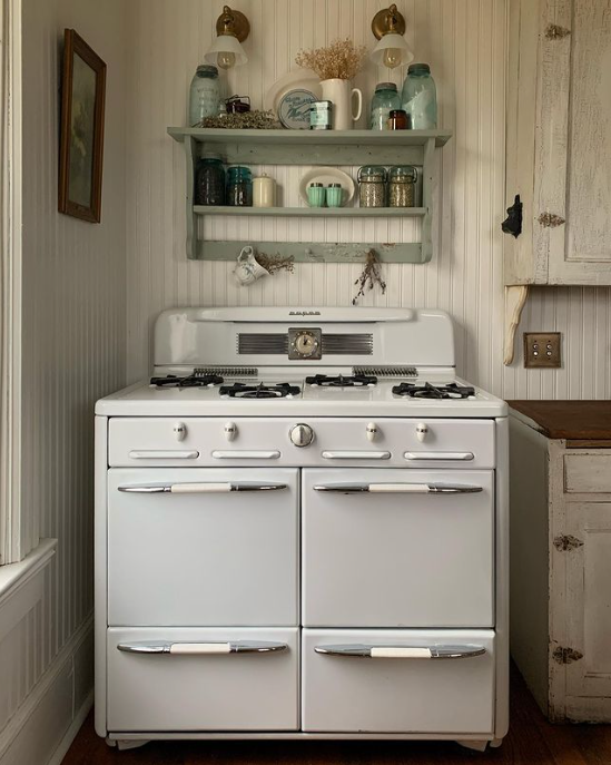Bryarton Farms kitchen with vintage stove and shelves. 