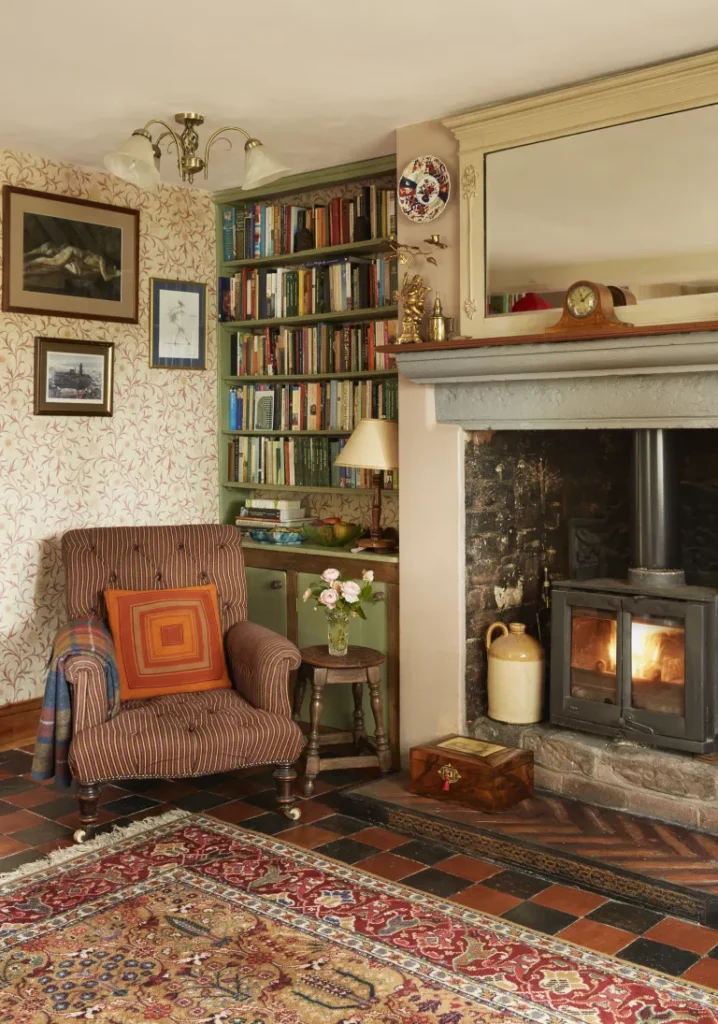 Every cottage needs the perfect spot for reading by the fire. Image from Real Homes. 