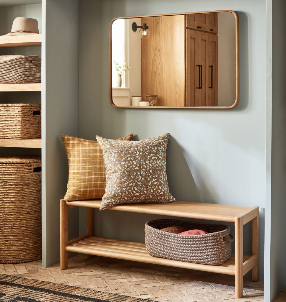 Wood storage bench with baskets from Rejuvenation.