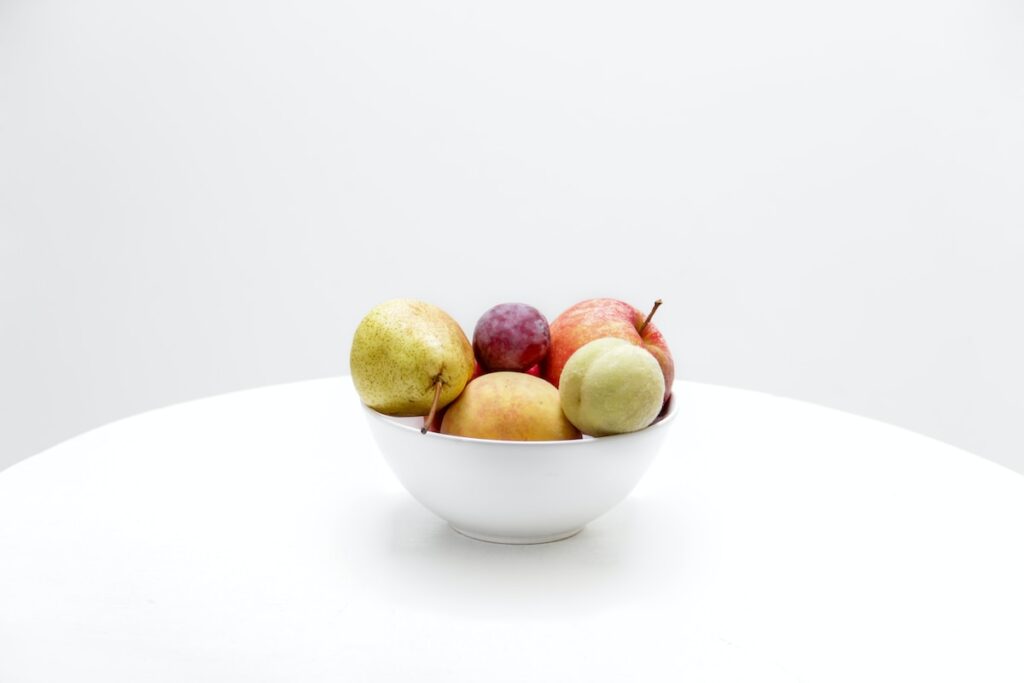 fruit in white ceramic bowl