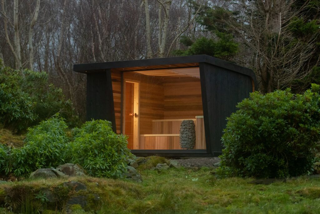 Black sauna in a forest.