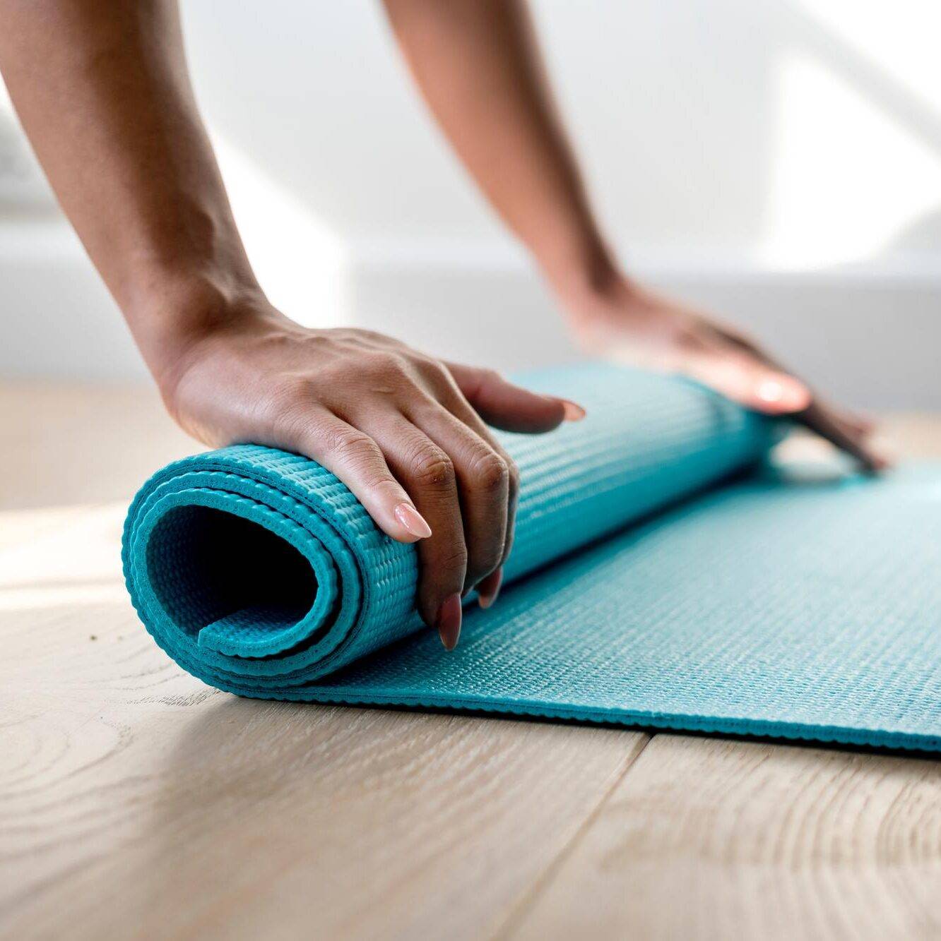 Yoga mat and participant