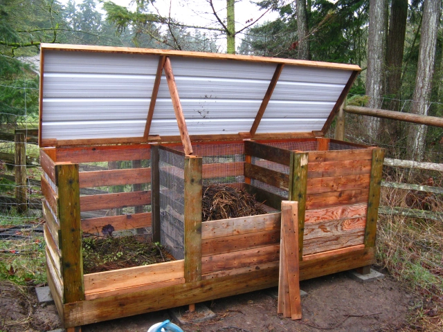 Composting bin with three compartments.