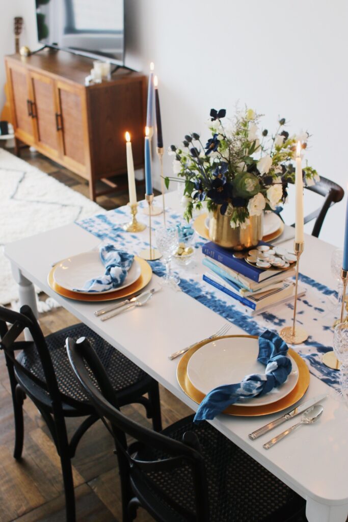 Beautiful Hanukkah tablescape with thoughtful details from rebekahlowin.com.