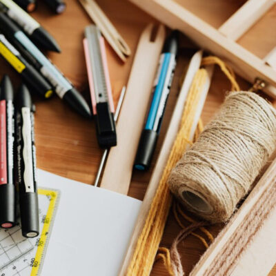 unorganized drawer with craft supplies