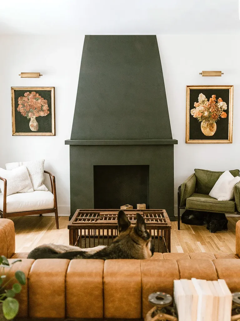 Deep green fireplace DIY makeover from Cleveland-based content creator. German Shepard on the couch. 