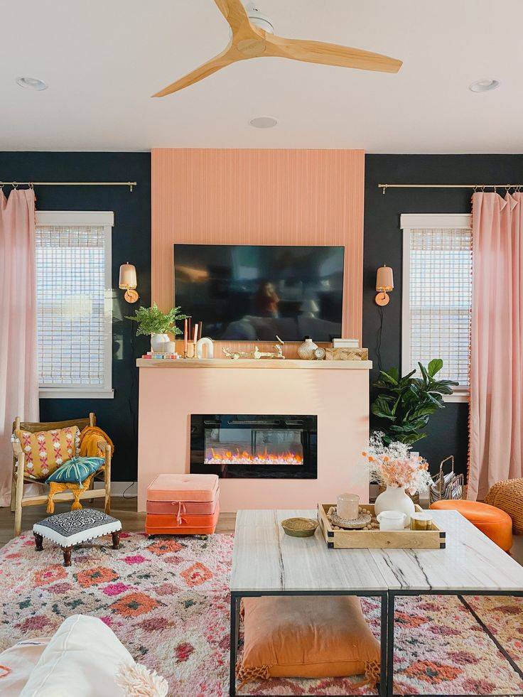 Pink mantel in living room with electric fireplace
