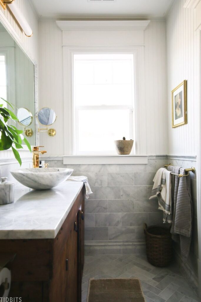 Bathroom with blue gray textured wainscoting 