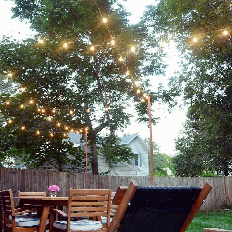 DIY outdoor bistro light stands: 59 DIY landscaping ideas