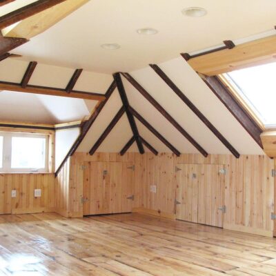 Wooden empty attic with wood floors