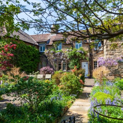 a house with a garden in front of it