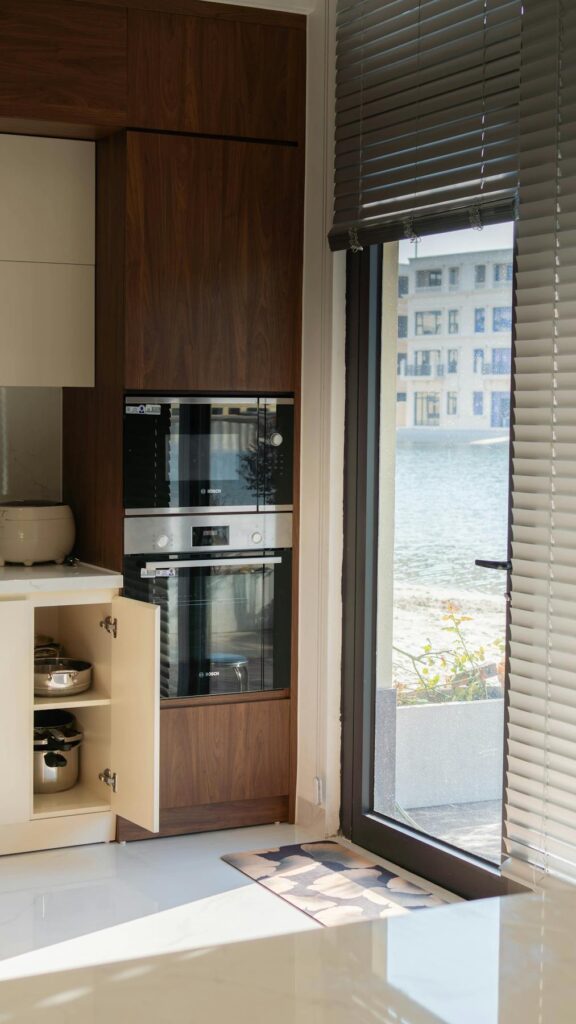 Stylish kitchen interior featuring modern appliances and view of Hải Phòng, Vietnam.